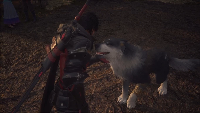 Clive petting Torgal with a sword on his back in Final Fantasy 16